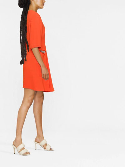 Shop Stella Mccartney Chain-detail Draped Mini Dress In Orange