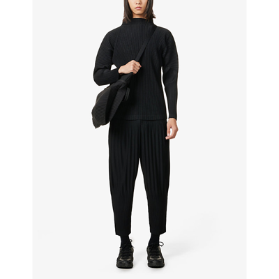 Shop Issey Miyake Basics Pleated Balloon-leg Relaxed-fit Woven Trousers In 15-black
