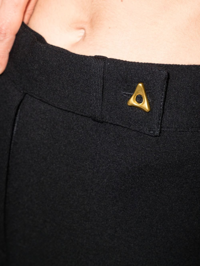 Shop Aeron Madeleine Logo-plaque Knitted Trousers In Schwarz