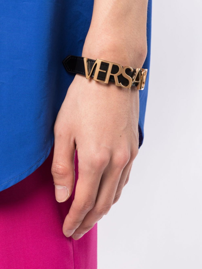 Shop Versace Logo-plaque Bracelet In Black