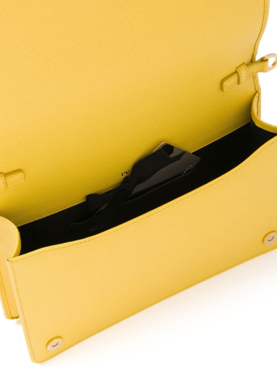 Shop Prada Saffiano-leather Mini Bag In Gelb