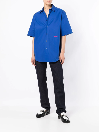 Shop Versace Contrast-logo Poplin Bowling Shirt In Blau