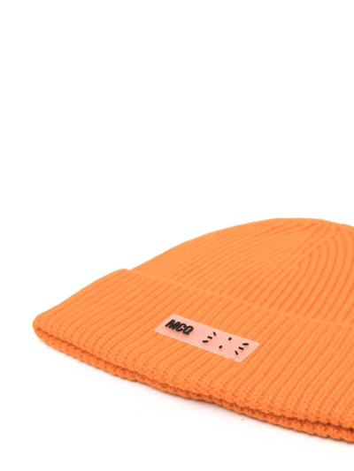 Shop Mcq By Alexander Mcqueen Logo-patch Ribbed-knit Beanie In Orange