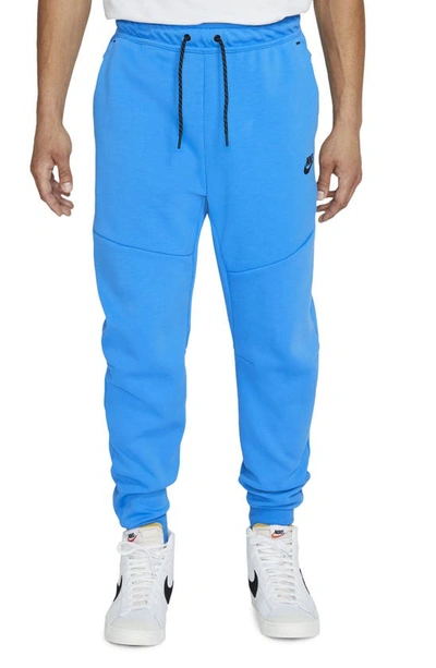 Shop Nike Tech Fleece Jogger Sweatpants In Light Photo Blue/ Black