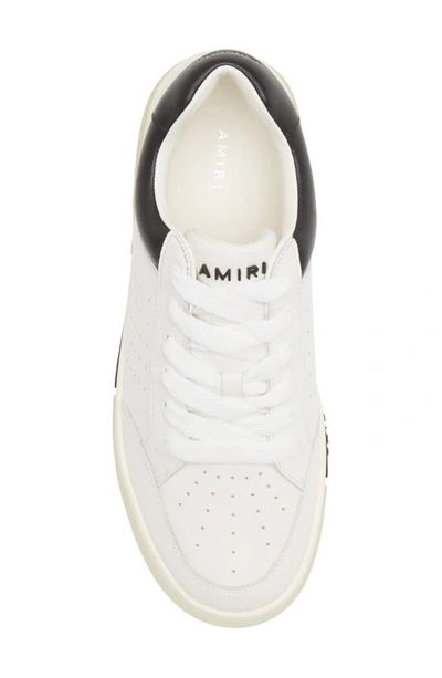 Shop Amiri Stadium Low Top Sneaker In White/ Black