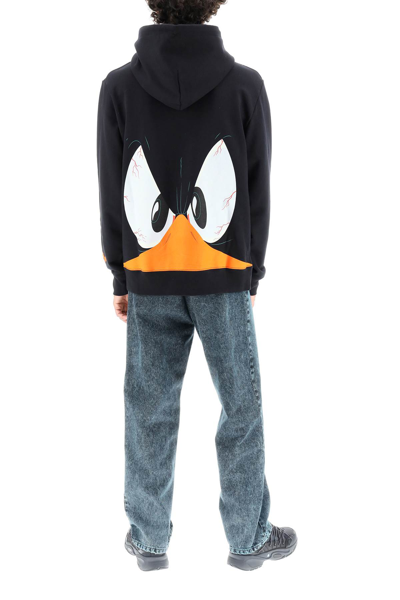 Shop Gcds Looney Tunes Daffy Duck Hoodie In Black