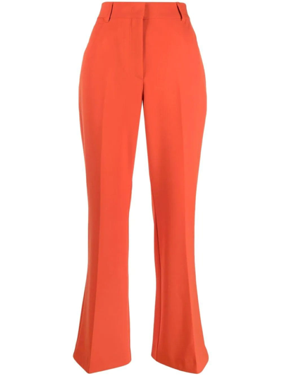 Shop Stella Mccartney Orange High-rise Flared Trousers