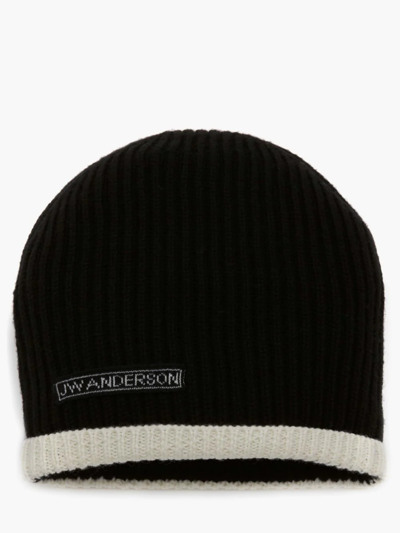 Shop Jw Anderson Bumper-tube Knitted Beanie In Black