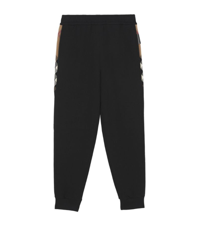 Shop Burberry Check-panel Sweatpants In Black
