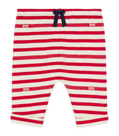 Shop Gucci Kids Striped Interlocking G Trousers (0-36 Months) In Red