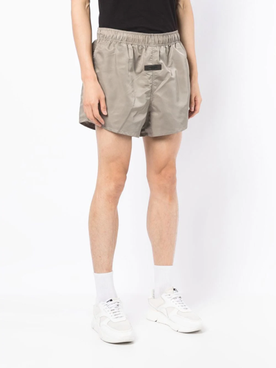 Essentials Front-logo Techical Track Pants In Green