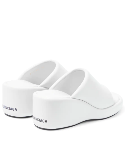 Shop Balenciaga Rise Leather Wedge Sandals In White/black