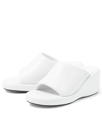 Shop Balenciaga Rise Leather Wedge Sandals In White/black