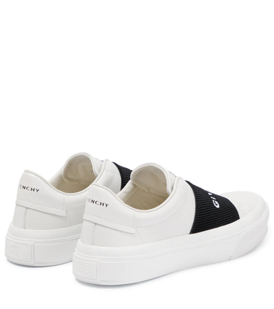 Shop Givenchy City Sport Leather Sneakers In White/black