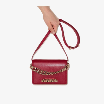 Shop Alexander Mcqueen Four Ring Shoulder Bag In Red