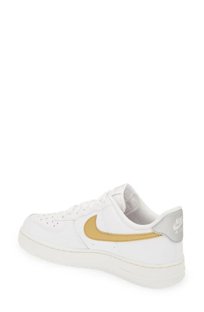 Shop Nike Air Force 1 '07 Sneaker In White/ Gold/ Silver