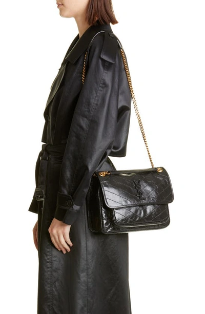 Shop Saint Laurent Medium Niki Matelassé Leather Shoulder Bag In 1000 Nero