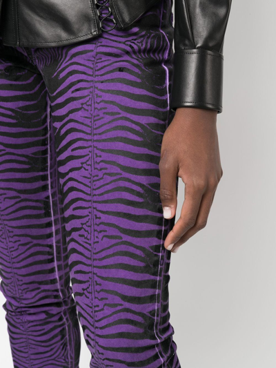Shop Roberto Cavalli Tiger-stripes Skinny Trousers In Black