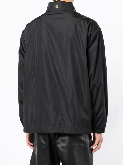 Shop Versace Chest-loog Hooded Jacket In Schwarz