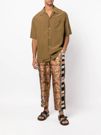 Shop Pierre-louis Mascia Panelled Graphic-print Silk Trousers In Braun