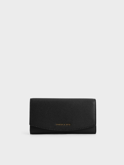 Shop Charles & Keith Curved Flap Long Wallet In Black