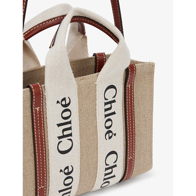 Shop Chloé Woody Mini Cotton-canvas Tote Bag In White - Brown 1