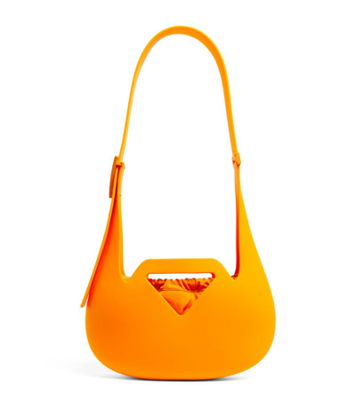 Shop Bottega Veneta Recyclable Rubber Punch Shoulder Bag In Yellow