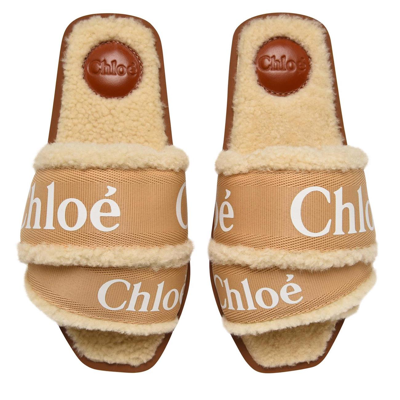 Shop Chloé Woody Shearling Lined Sandals In Beige