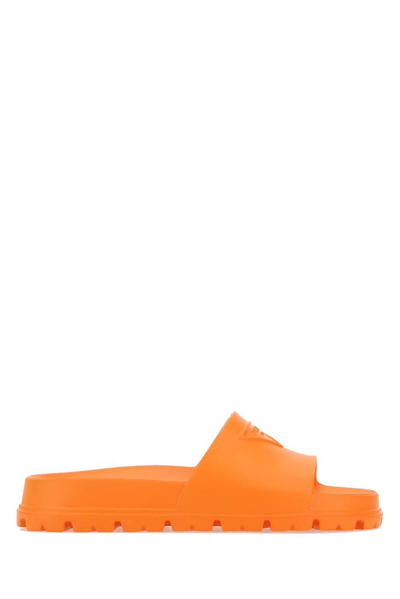 Shop Prada Logo Embossed Slip In Orange