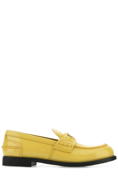 Shop Miu Miu Round Toe Penny Loafers In Yellow