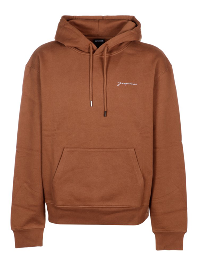Shop Jacquemus Logo Embroidered Drawstring Hoodie In Brown