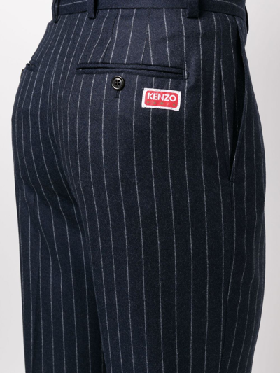 Shop Kenzo Tapered Pinstripe-print Trousers In 蓝色