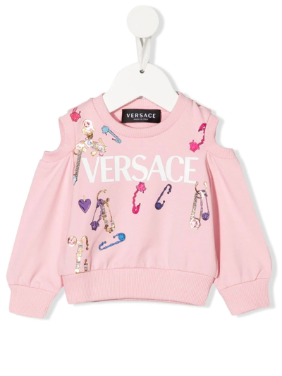 Shop Versace Logo-print Cut-out Sweatshirt In 粉色
