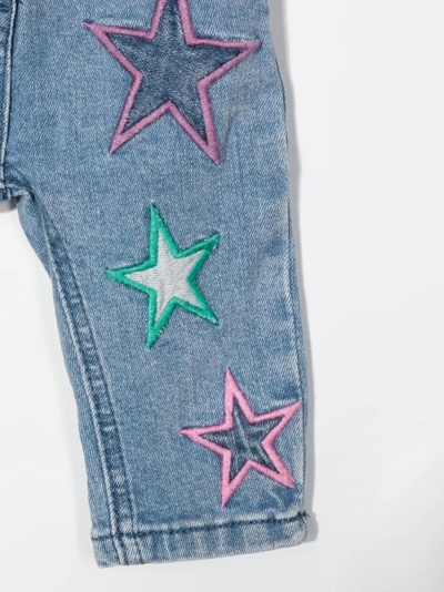 Shop Stella Mccartney Star-embroidered Slim-cut Jeans In Blue