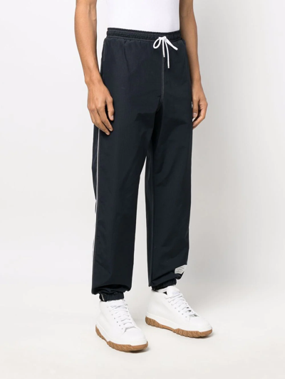 Thom Browne Contrast White Stitching Ripstop Track Pants In 415 Navy