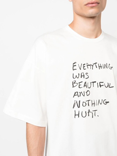 Shop Oamc Slogan-print Cotton T-shirt In Weiss