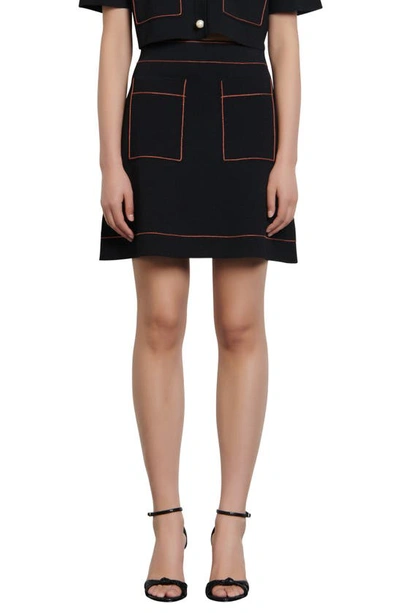 Shop Sandro Elanna Knit Miniskirt In Black