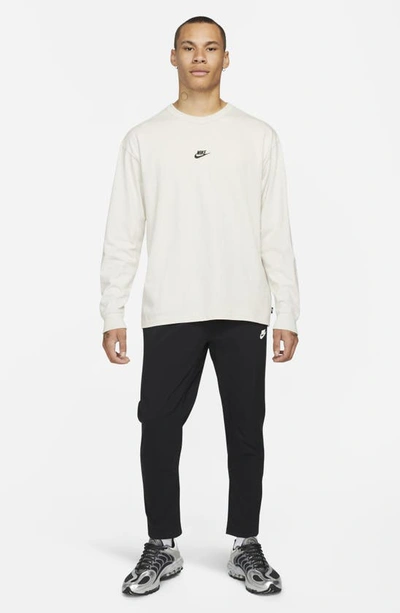 Shop Nike Sportswear Premium Essentials Long Sleeve T-shirt In Light Bone/ Black