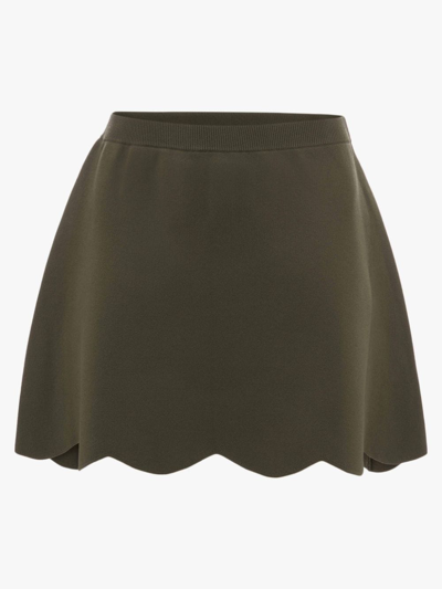 Shop Jw Anderson Scalloped Hem Mini Skirt In Green