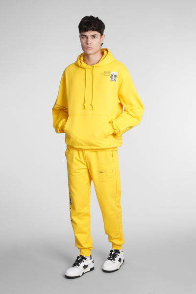 Shop Helmut Lang Pants In Yellow Cotton