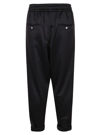 Shop Balmain Slouchy Monogram Jersey Pants In Eap Noir Noir