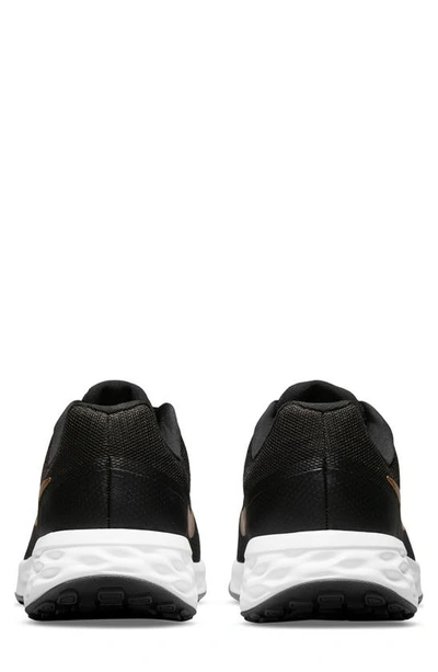 Shop Nike Revolution 6 Next Nature Road Running Shoe In Black/metallic Gold-white