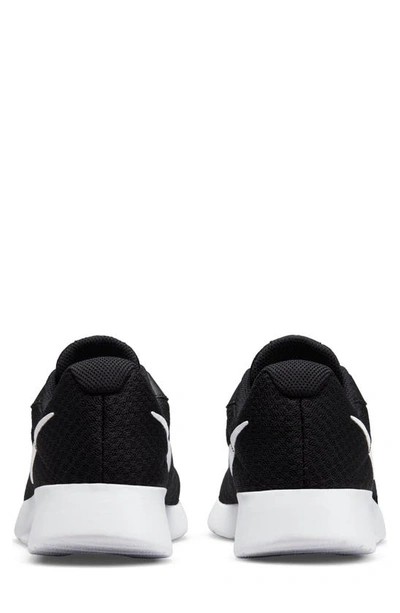Shop Nike Tanjun Running Shoe In Black/white