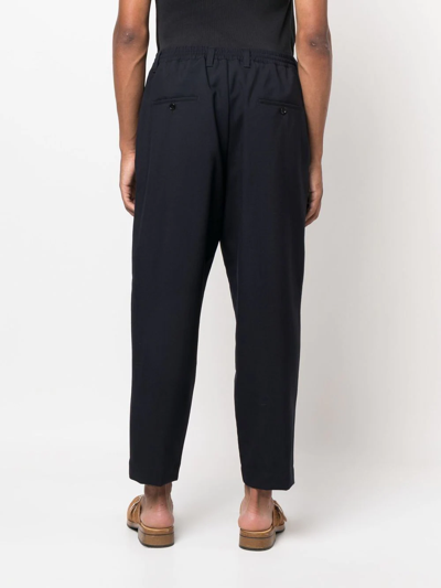 Shop Marni Virgin-wool Tapered Trousers In Blue