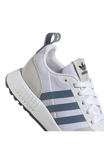 Shop Adidas Originals X Her Studio London Kids' Multix Sneaker In White/ Blue/ Grey