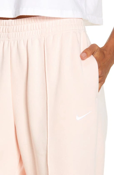 Shop Nike Sportswear Essential Fleece Pants In Atmosphere/ White