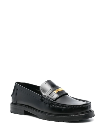 Shop Moschino Logo-plaque Detail Loafers In Schwarz