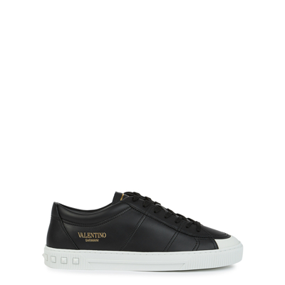 Shop Valentino Garavani City Planet Black Leather Sneakers