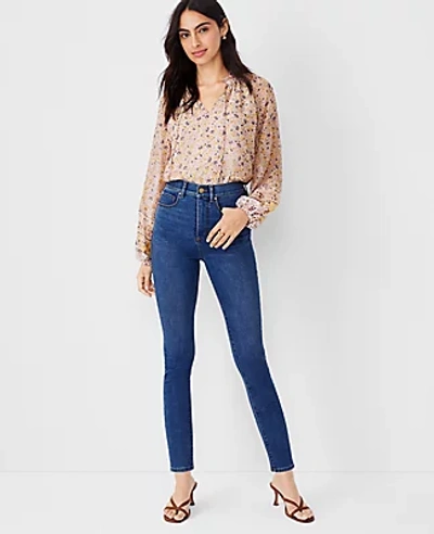 Shop Ann Taylor Petite Sculpting Pocket Highest Rise Skinny Jeans In Classic Mid Wash