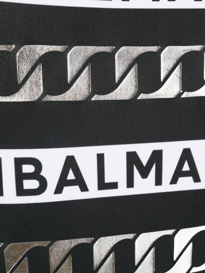 Shop Balmain Striped Logo-print Swimsuit In Schwarz